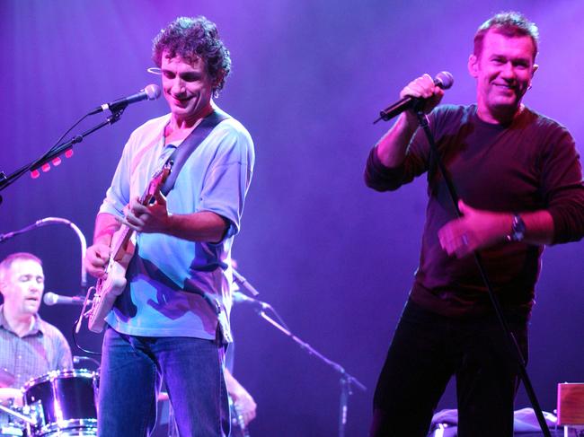 Moss on stage with Jimmy Barnes for Cold Chisel. Picture: Robert McKell