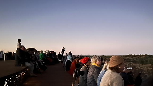 Crowds wait for the opening of the Wintjiri Wiru exhibition. Credit: Anangu share the Mala story, from Kaltukatjara to Uluru, through a drone, sound and light show designed and produced by RAMUS.