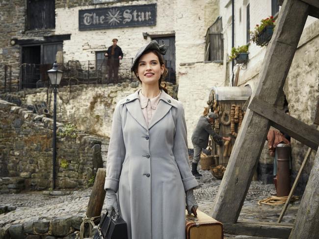 Lily James plays Juliet Ashton in The Guernsey Literary and Potato Peel Pie Society.