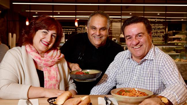 Frank Pangallo and his wife Angie enjoy a pasta at one of his favourite places, PastaDeli, at Glynburn with owner Frank Taddeo. Picture: Bianca De Marchi