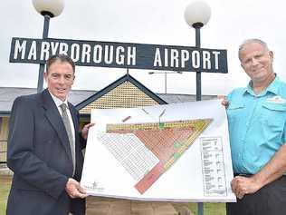 BIG PLANS: Fraser Coast Residential Airpark Pty Ltd director Brad Tallis (right) with Mayor Gerard O’Connell and plans for the proposed development. Picture: Alistair Brightman