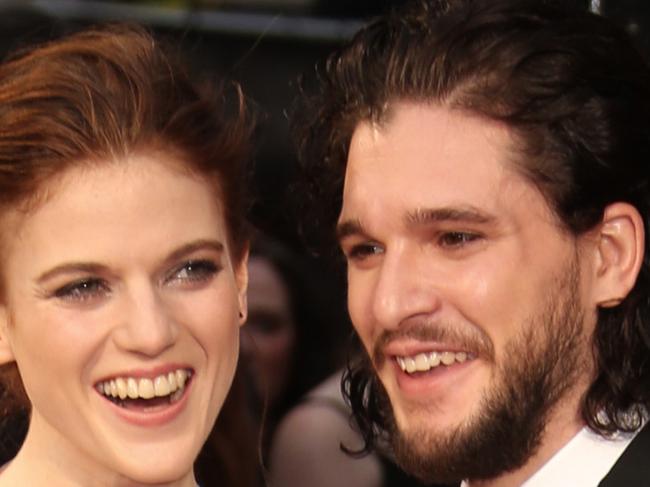 Actors Rose Leslie, left, and Kit Harrington pose for photographers upon arrival at the Olivier Awards in London, Sunday, April 3, 2016. (Photo by Joel Ryan/Invision/AP)