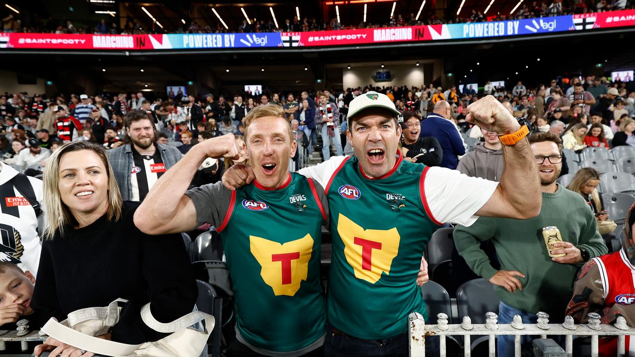 MELBOURNE, AUSTRALIA - MARCH 21: Tasmania Devils fans Bradley Cox-Goodyear (left) and Will Tatchell pose for a photograph during the 2024 AFL Round 02 match between the St Kilda Saints and the Collingwood Magpies at the Melbourne Cricket Ground on March 21, 2024 in Melbourne, Australia. (Photo by Michael Willson/AFL Photos via Getty Images)