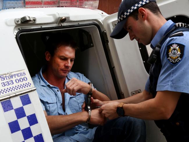 Ben Cousins leaves Fremantle police station in 2015.