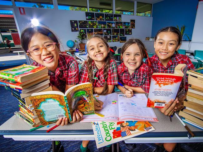 McDowall State School students Annabella Yang Yr 5, Amelia Mace Yr 3, Miriam Macks Yr 3 and Lelia Luc Yr 5 ahead of NAPLAN release results. Picture: Nigel Hallett