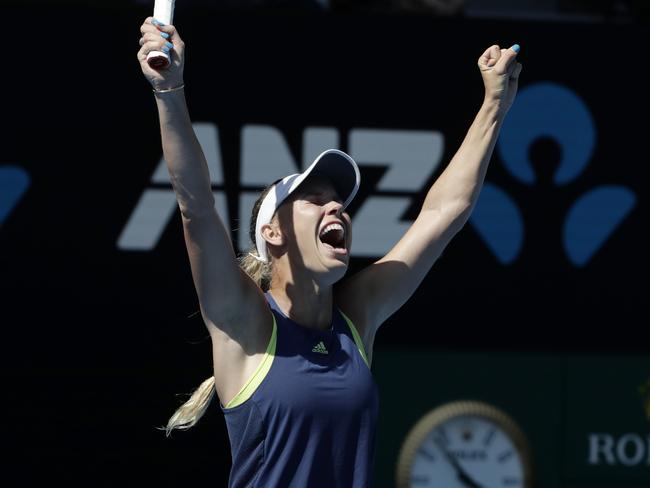 Caroline Wozniacki screams for joy after making it through to the Australian Open final. Picture: AAP