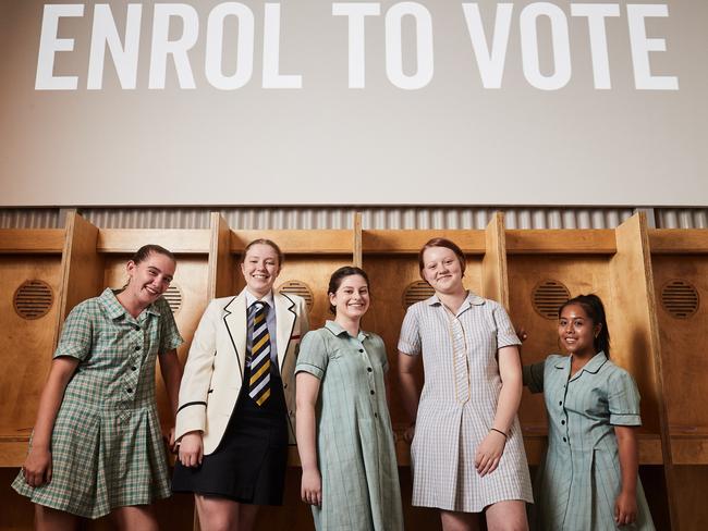 Kiana Lee, 16, from Henley High, Lara Candy, 16 (Pulteney Grammar), Concetta Amuso, 16 (Thomas More), Lily Gara, 16 (Adelaide High School) and Chantelle-Jordan-Bernardo, 16 (Thomas Mote College) at polling booths at the Centre for Democracy. AAP Image/MATT LOXTON