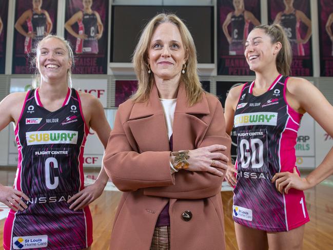 Thunderbirds Hannah Petty (L), and Matilda Garrett (R) with Netball SA CEO Bronwyn Klei. Picture: Mark Brake