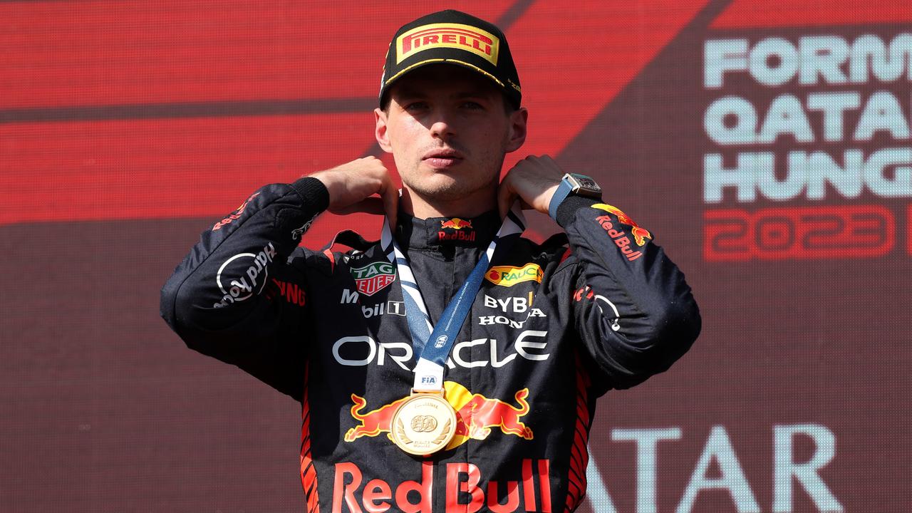 BUDAPEST, HUNGARY - JULY 23: Race winner Max Verstappen of the Netherlands and Oracle Red Bull Racing celebrates on the podium during the F1 Grand Prix of Hungary at Hungaroring on July 23, 2023 in Budapest, Hungary. (Photo by Peter Fox/Getty Images)