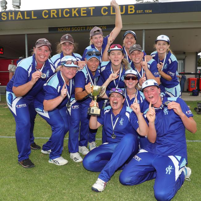 Barwon Heads celebrate its grand final win with the premiership cup. Picture: Mark Wilson