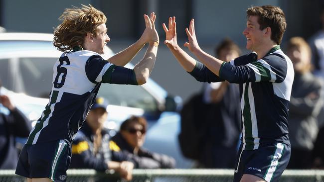 Max Filmer of St Patrick's College (L) celebrates kicking a goal. (Photo by Daniel Pockett/AFL Photos/via Getty Images)