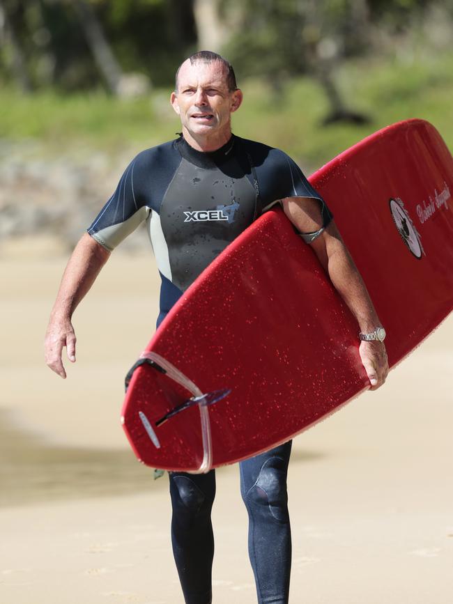 Former Prime Minister Tony Abbott takes a surf at Noosa in 2015. Picture: Lachie Millard