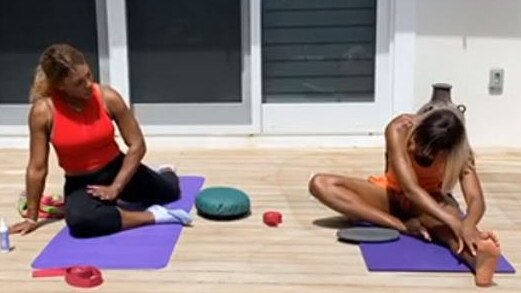 Serena and Venus Williams stretch out during an Instagram yoga session Picture: Instagram