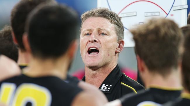 Richmond coach Damien Hardwick speaks to his players during the JLT Series. Picture: Getty