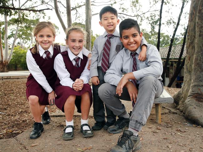 Stella van der Steege, 7, Mia Rowe, 11, Joshua Kang, 5, and Devaang Parasher, 12 ahead of their mufti day fundraiser for farmers. Picture: Richard Dobson