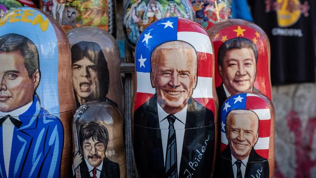 Russian nesting dolls of U.S President Joe Biden and Chinese leader Xi Jinping are seen at a souvenir stand in Kyiv, Ukraine.