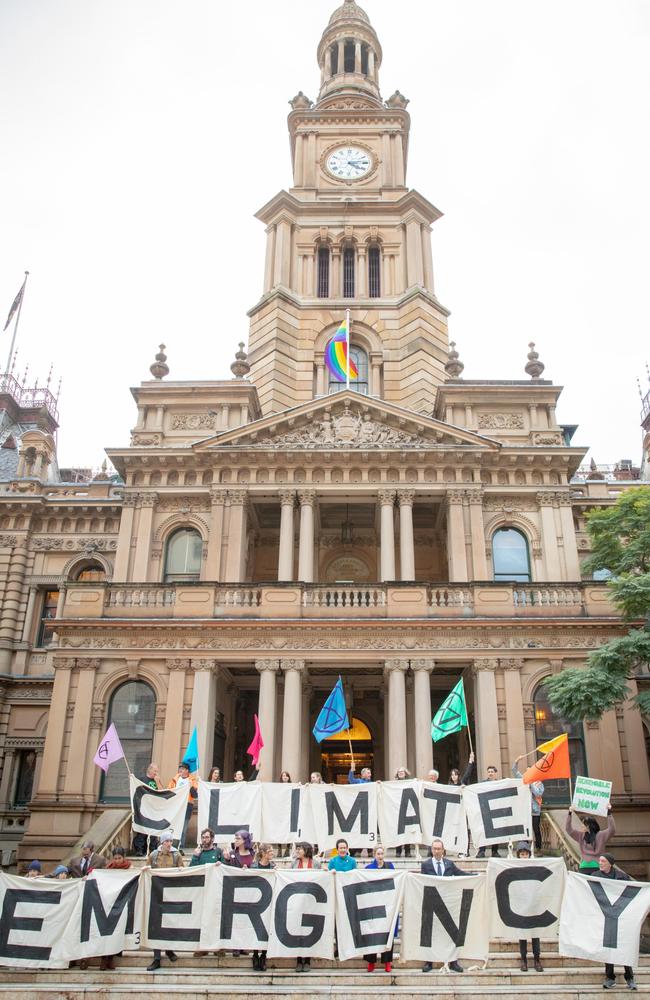 City of Sydney Lord Mayor Clover Moore with fellow councillors on Monday ahead of the meeting.