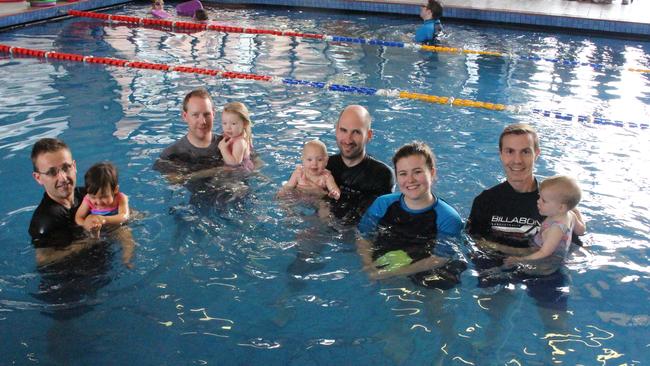 Fathers with infants learning to swim at the Strathmont Centre pool. Picture: SUPPLIED