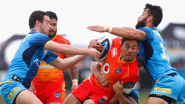 WHANGAREI, NEW ZEALAND - FEBRUARY 13: Ben Henry of the Warriors is tackled during the NRL Trial Match between the New Zealand Warriors and the Gold Coast Titans at Toll Stadium on February 13, 2016 in Whangarei, New Zealand. (Photo by Phil Walter/Getty Images)