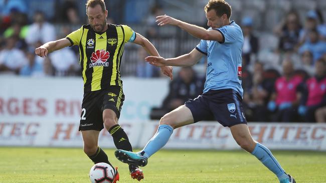 Andrew Durante, left, wins possession during the Phoenix’s surprise win over Sydney FC. Picture: Getty Images