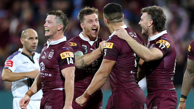 Cameron Munster and the Maroons celebrate during game one. Picture: Getty