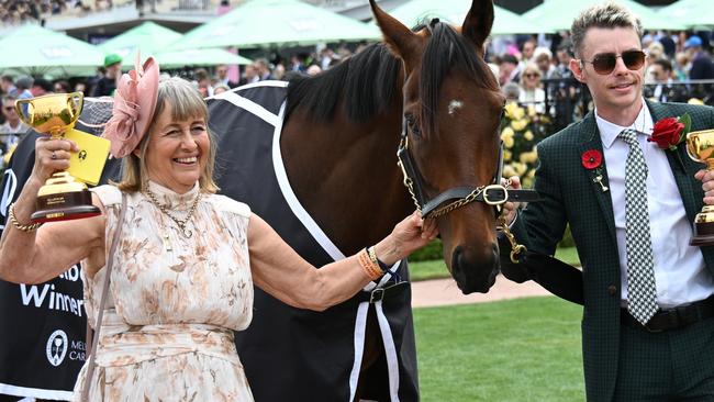 MELBOURNE, AUSTRALIA - NOVEMBER 09:  Melbourne Cup winning Co trainers Sheila Laxon and John Symons, jockey Robbie Dolan and connections pose with Knight's Choice during Champion Stakes Day at Flemington Racecourse on November 09, 2024 in Melbourne, Australia. (Photo by Vince Caligiuri/Getty Images)