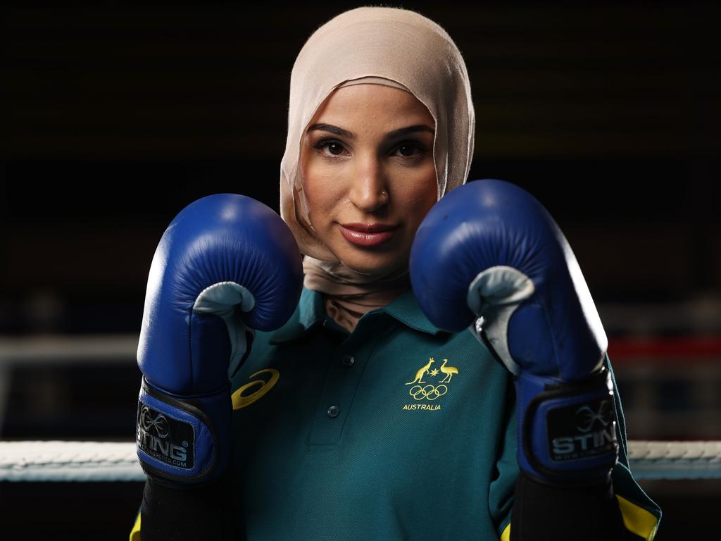 Aussie boxier Tina Rahmi has smashed the Paris Olympics over a controversial ban that will stop French Muslim athletes from competing with their traditional headdress.