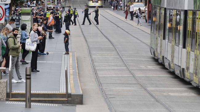 Bourke st remains busy after the incident. Picture: Rob Leeson.