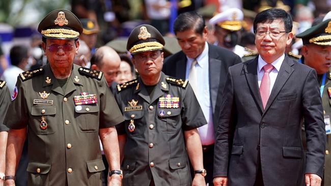 Cambodia's Defence Minister Tea Banh (L) and China's Ambassador to Cambodia Wang Wentian (R) take part in a groundbreaking ceremony at the Ream naval base in Preah Sihanouk province on June 8, 2022. (Photo by Pann Bony / AFP)