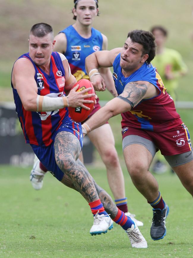 Football GDFL: Belmont Lions v Bell Post Hill Belmont Lions 42 Brad Storm chases Bell Post Hill 22 Sam Harmer Picture: Mark Wilson