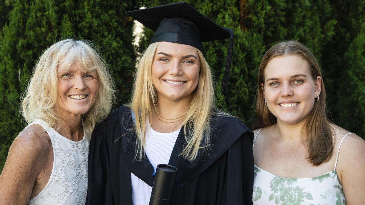 Bachelor of Sport and Exercise Science (Honours) graduate Briana Dascombe with mum Helen Dascombe and sister Cassie Dascombe at the UniSQ graduation ceremony at Empire Theatres, Wednesday, December 14, 2022.