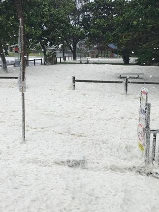 The high tide and storm surge combined makes a dangerous due at Sarina Beach.