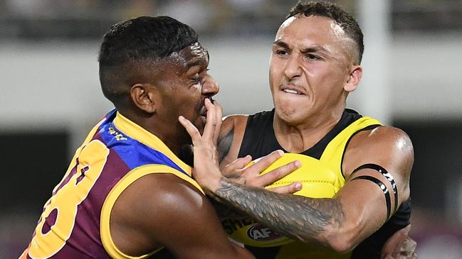 Shai Bolton is tackled by Keidean Coleman in the second qualifying final between Brisbane and Richmond. Picture: Quinn Rooney/Getty Images