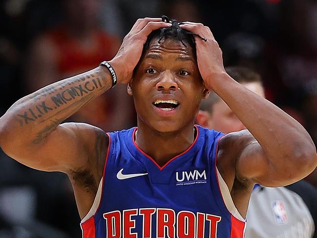 ATLANTA, GEORGIA - DECEMBER 18:  Marcus Sasser #25 of the Detroit Pistons reacts after he was charged with a foul against Trae Young #11 of the Atlanta Hawks during the fourth quarter at State Farm Arena on December 18, 2023 in Atlanta, Georgia.  After a coach's challenge, the call on the court was confirmed.  NOTE TO USER: User expressly acknowledges and agrees that, by downloading and/or using this photograph, user is consenting to the terms and conditions of the Getty Images License Agreement.  (Photo by Kevin C. Cox/Getty Images)