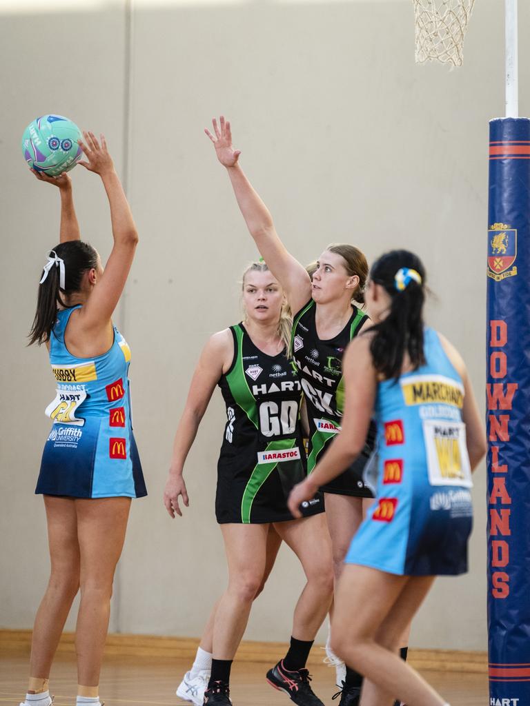 Jessica Cerezo (centre) defends for Darling Downs Panthers.