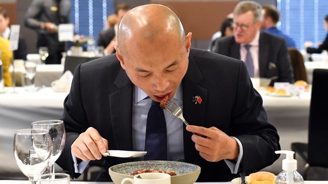 China's Deputy Head of Mission Wang Xining samples Australian exports at the National Press Club. Picture: Sam Mooy/Getty Images