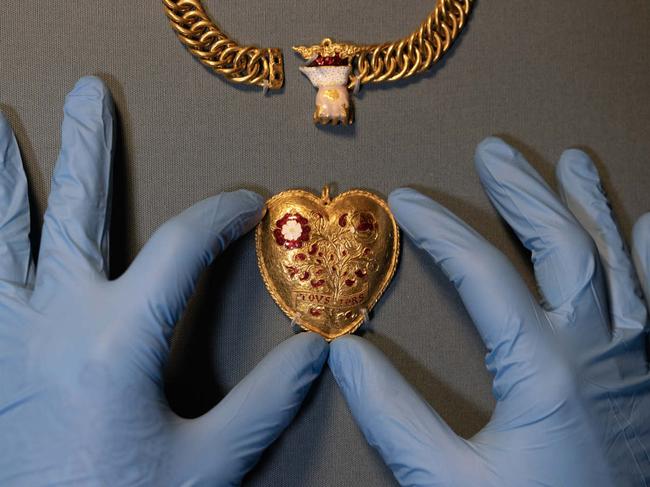 The stunning locket also features a glittering pomegranate bush and double-headed Tudor rose. Picture: Dan Kitwood / Getty Images / New York Times.