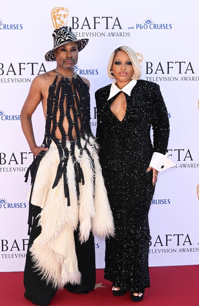 Always a red carpet favourite, Billy Porter rocked a braided bodice, tasselled skirt and a statement hat, pictured alongside Marisha Wallace who looked glam in a tuxedo inspired gown. Picture: Stuart C. Wilson/Getty Images