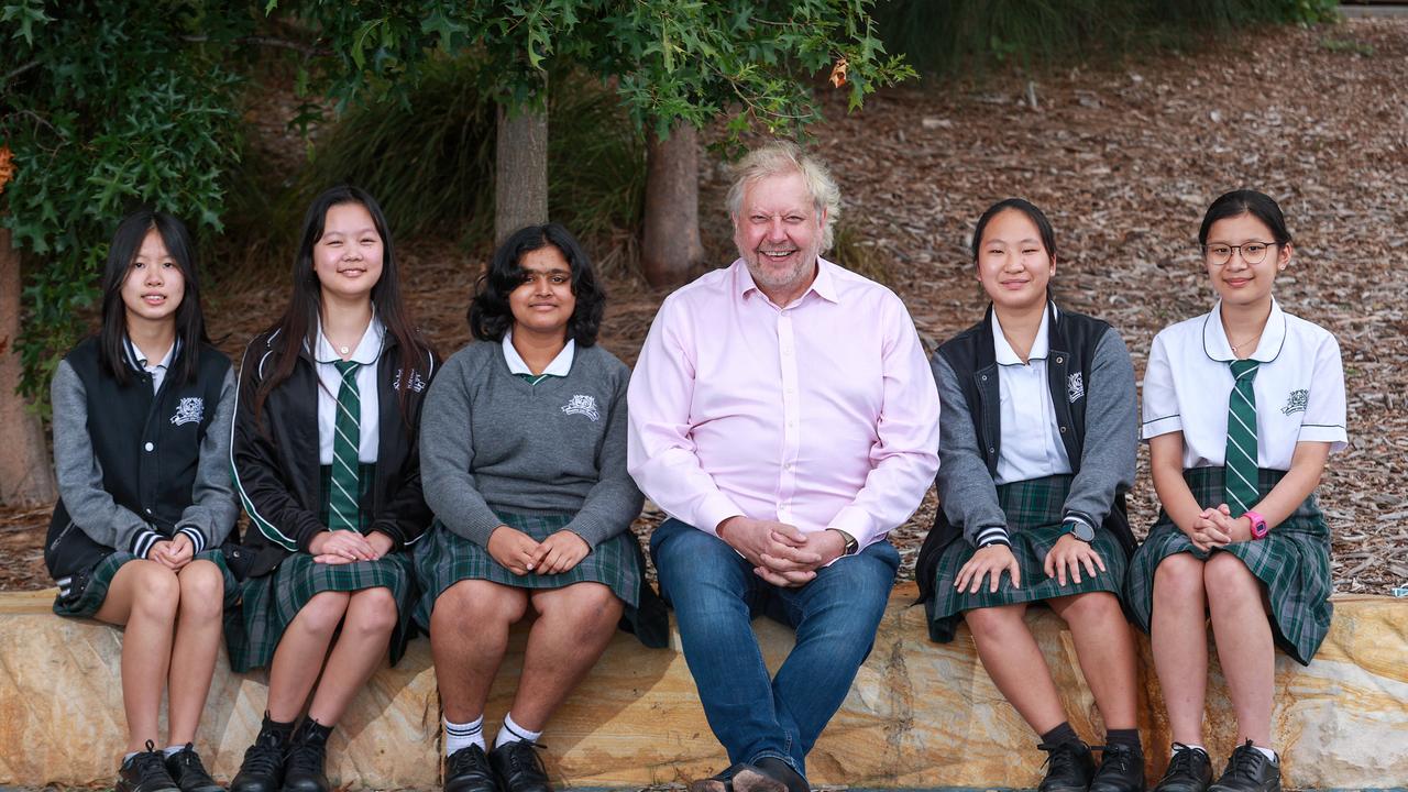 Richard White with Year 9 Auburn Girls High pupils, Wendy Huang, Dorothy Zhang, Jahnavi Gadale, Selina Lin, Htoi Tsawm Ra Maran, at Auburn Girls High School. Picture: Justin Lloyd