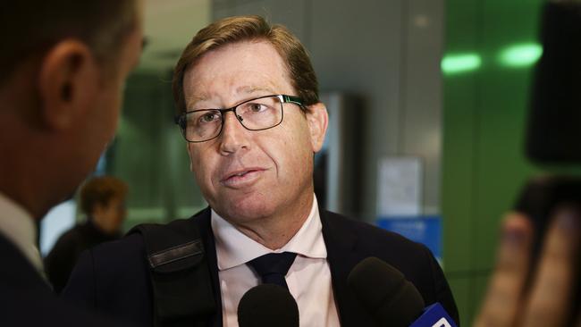 Troy Grant arrives at Sydney Airport to be greeted by the media. Picture: Justin Lloyd