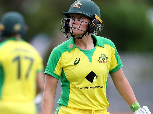 Australia's Alyssa Healy walks from the field after being caught during the second women's Twenty20 cricket match between New Zealand and Australia in Napier on March 30, 2021. (Photo by Marty MELVILLE / AFP)