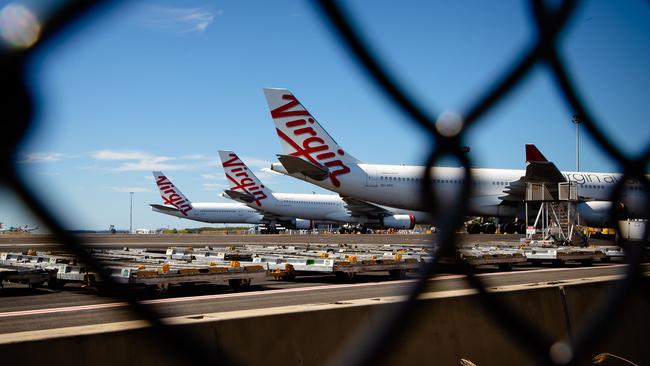 Virgin Australia aircraft parked on the tarmac at Brisbane Airport. Picture: AFP