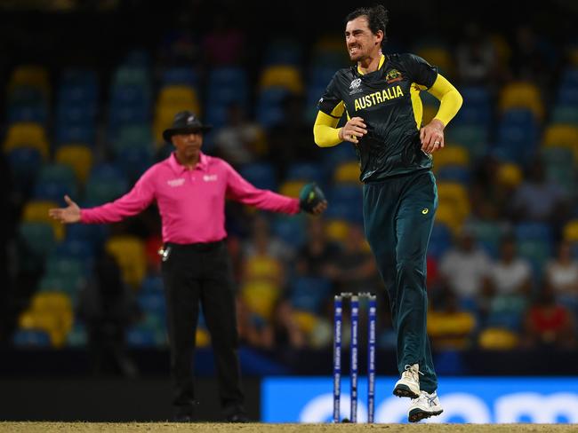 Mitchell Starc grimacing at the bowling crease. Picture: Gareth Copley/Getty Images