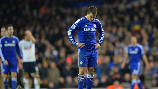 Chelsea's Belgian midfielder Eden Hazard (C) reacts at the final whistle in the English Premier League football match between Tottenham Hotspur and Chelsea at White Hart Lane in London on January 1, 2015. Tottenham won the game 5-3. AFP PHOTO / GLYN KIRK == RESTRICTED TO EDITORIAL USE. NO USE WITH UNAUTHORIZED AUDIO, VIDEO, DATA, FIXTURE LISTS, CLUB/LEAGUE LOGOS OR “LIVE” SERVICES. ONLINE IN-MATCH USE LIMITED TO 45 IMAGES, NO VIDEO EMULATION. NO USE IN BETTING, GAMES OR SINGLE CLUB/LEAGUE/PLAYER PUBLICATIONS. ==