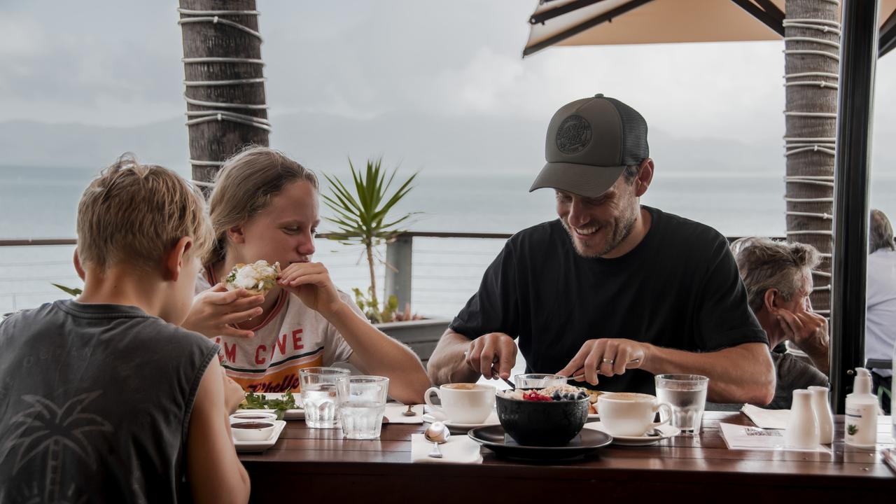 A family grabs a bite to eat at Cbar.