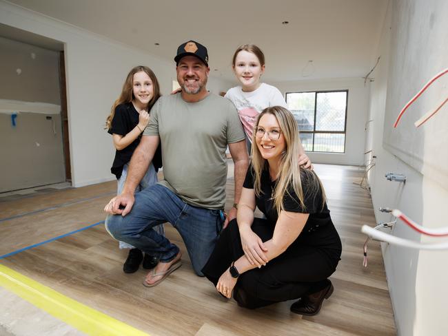 Anthony and Natasha Marsh with daughters Aubrey 6, and Georgia 9, are part of a renovation boom happening across Queensland and are spending $200k to renovate their Alexandra Hills home. Picture Lachie Millard