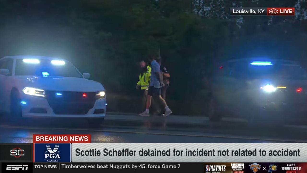 Scottie Scheffler being detained by police