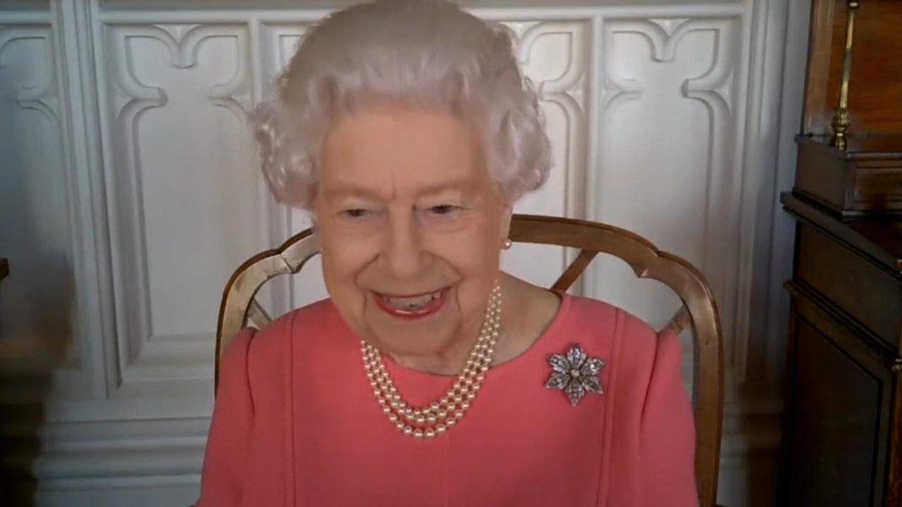 The Queen thanked health care staff involved in the vaccine program in Britain on a video call, and she paid subtle tribute to Prince Philip.