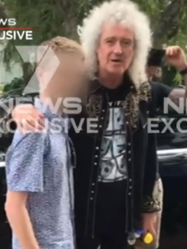 May notices the cameraman continuing to film him as he poses with a fan. Picture: Channel 7