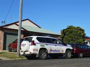 Warwick police officers wait outside the scene of the alleged homicide. . Picture: Tessa Flemming